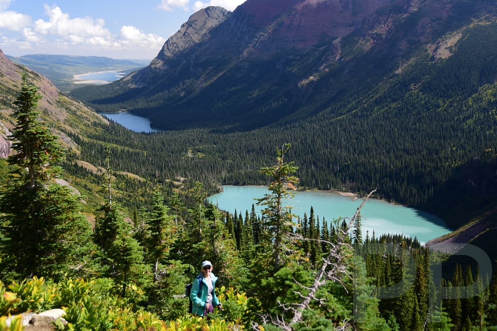 Alpine lake surrounded by steep mountain walls in the Many Glacier area of Glacier National Park