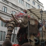 Elephant figure in a street performance in Piccadilly Circus London