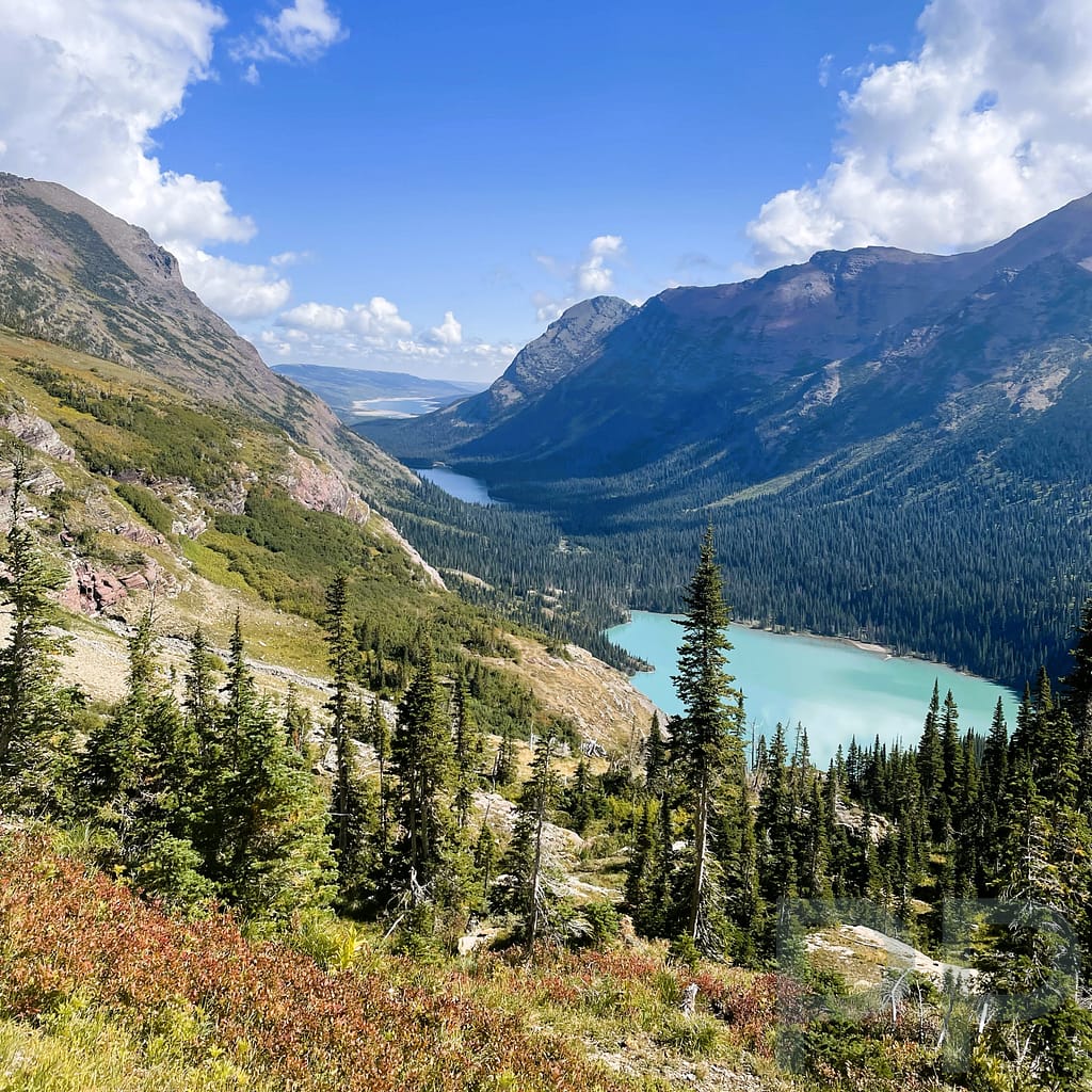 Scenic views of Grinnell Lake and Lake Josephine along the Grinnell Glacier Trail in Glacier National Park, Montana