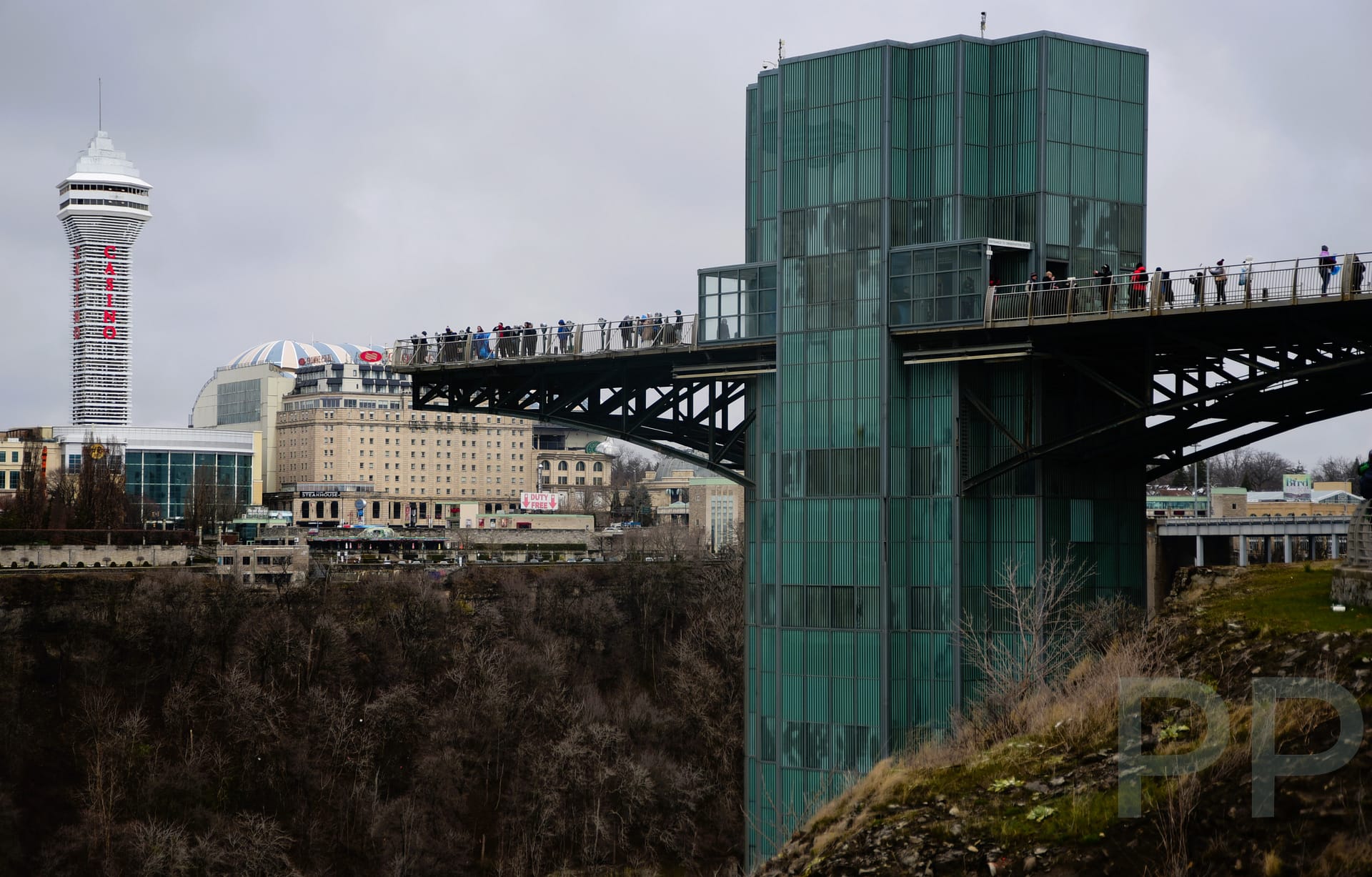 Niagara Falls Observation Tower with hotels across the river in the background