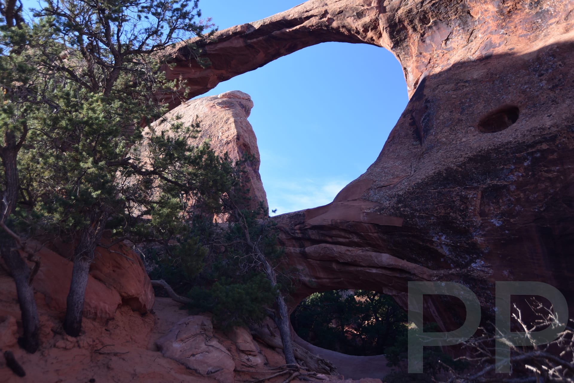 Double O Arch two stacked circular arches in Devils Garden Arches National Park