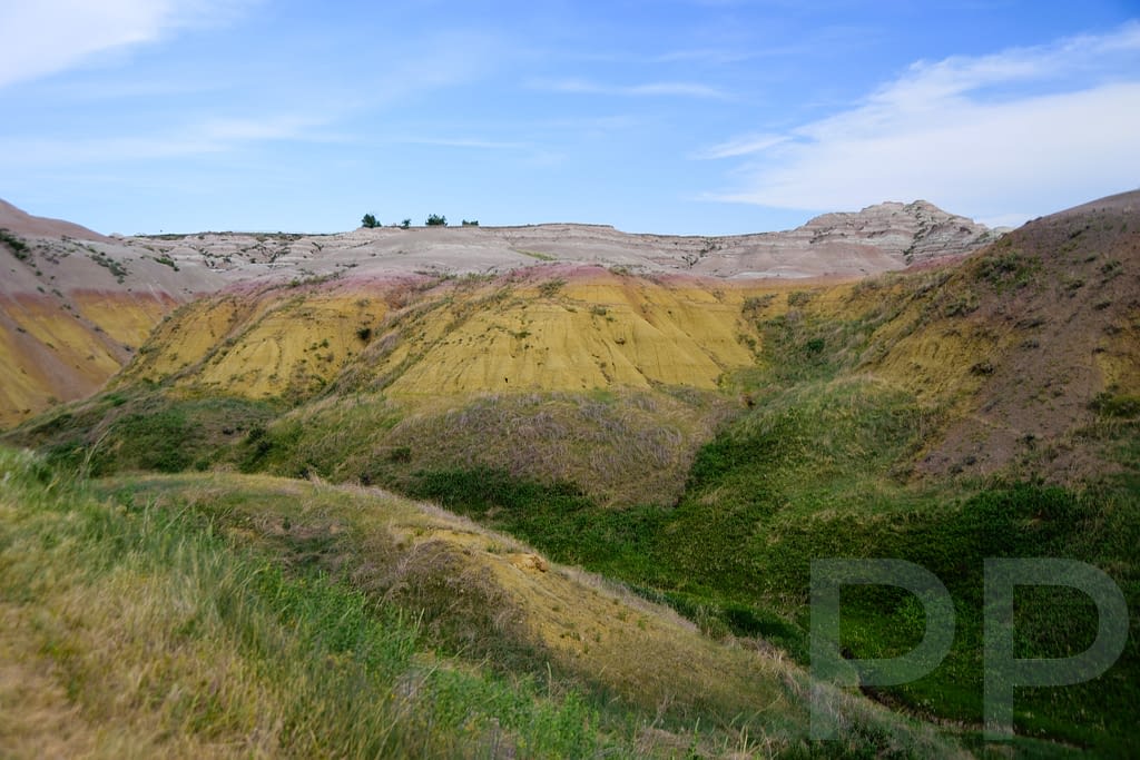 Yellow and orange rock formations at Yellow Mounds Overlook in Badlands National Park