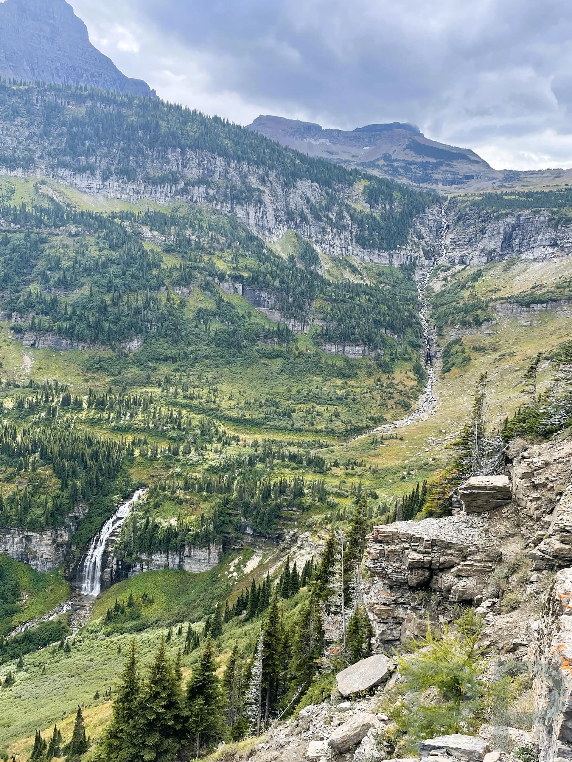 Bird Woman Falls cascading from Mount Oberlin as seen from the overlook along Going-to-the-Sun Road in Glacier National Park