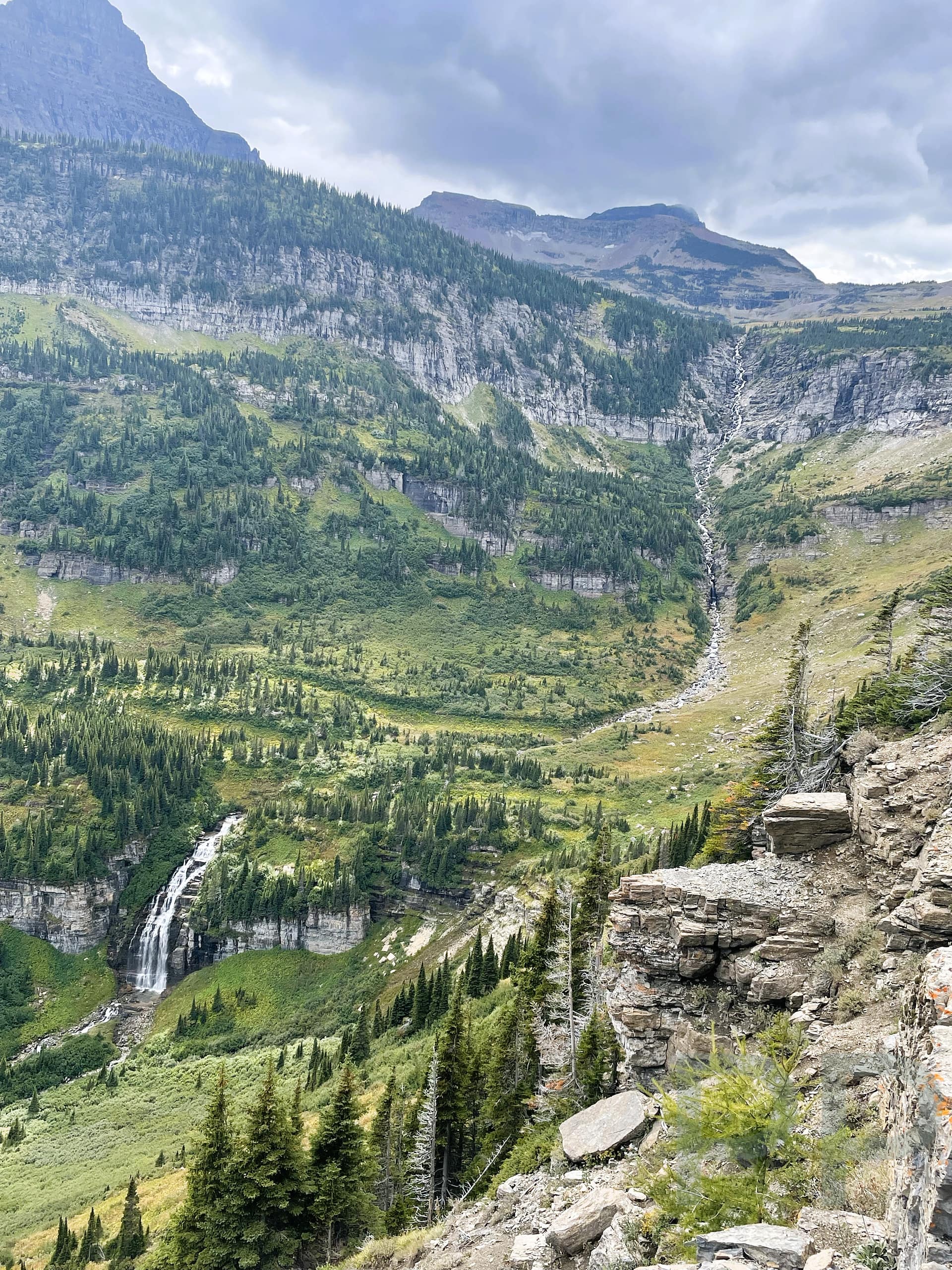 Bird Woman Falls cascading from Mount Oberlin as seen from the overlook along Going-to-the-Sun Road in Glacier National Park
