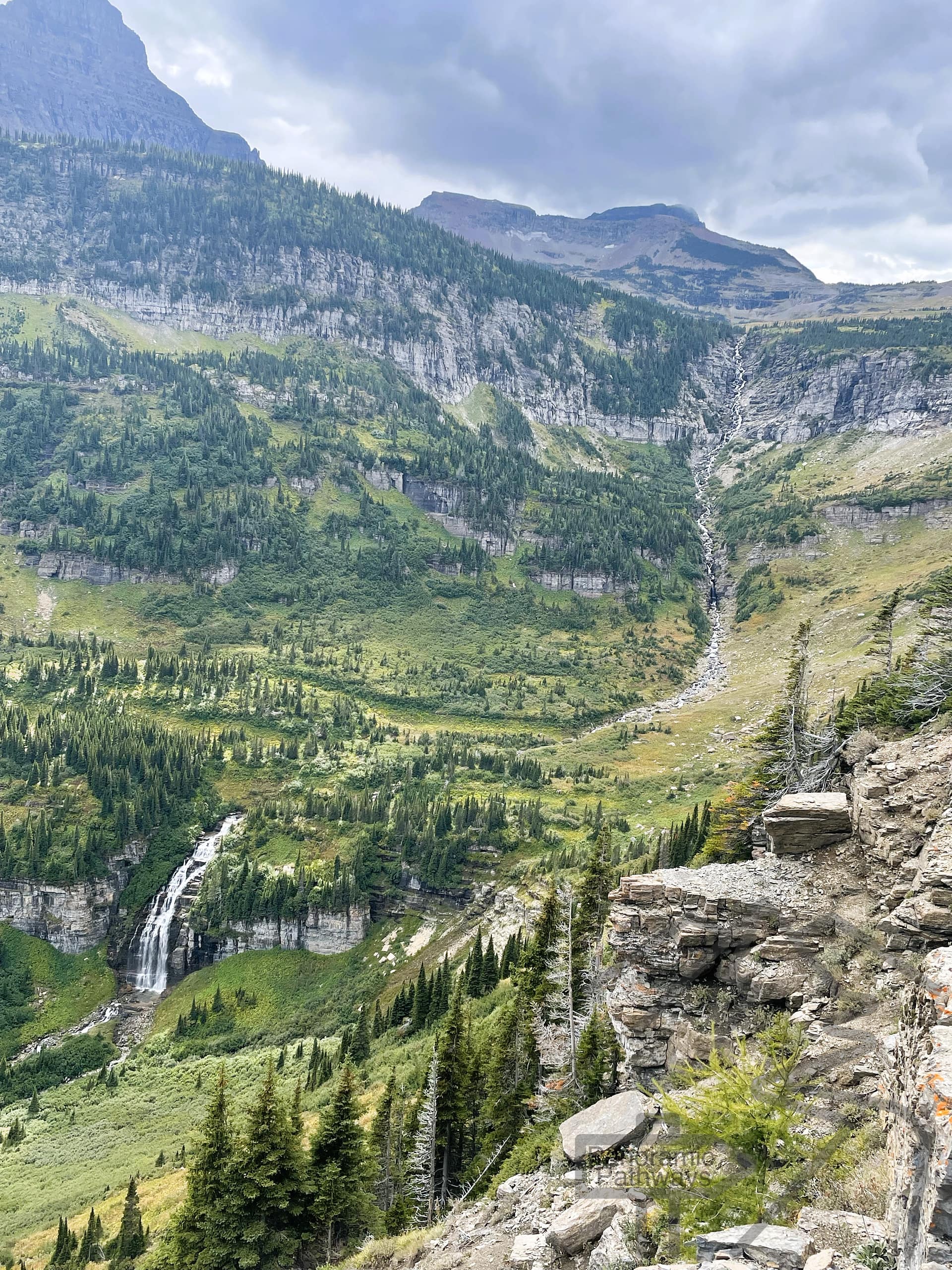 Bird Woman Falls cascading from Mount Oberlin as seen from the overlook along Going-to-the-Sun Road in Glacier National Park