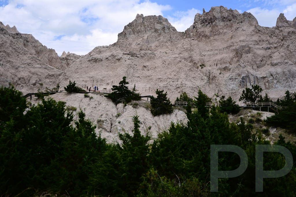 Wooden stairs climbing through rock formations on the Cliff Shelf Nature Trail