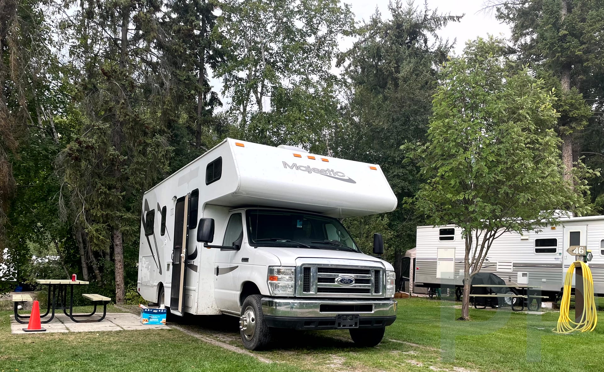 Grassy campsites at Canyon RV Resort in Radium Hot Springs, BC