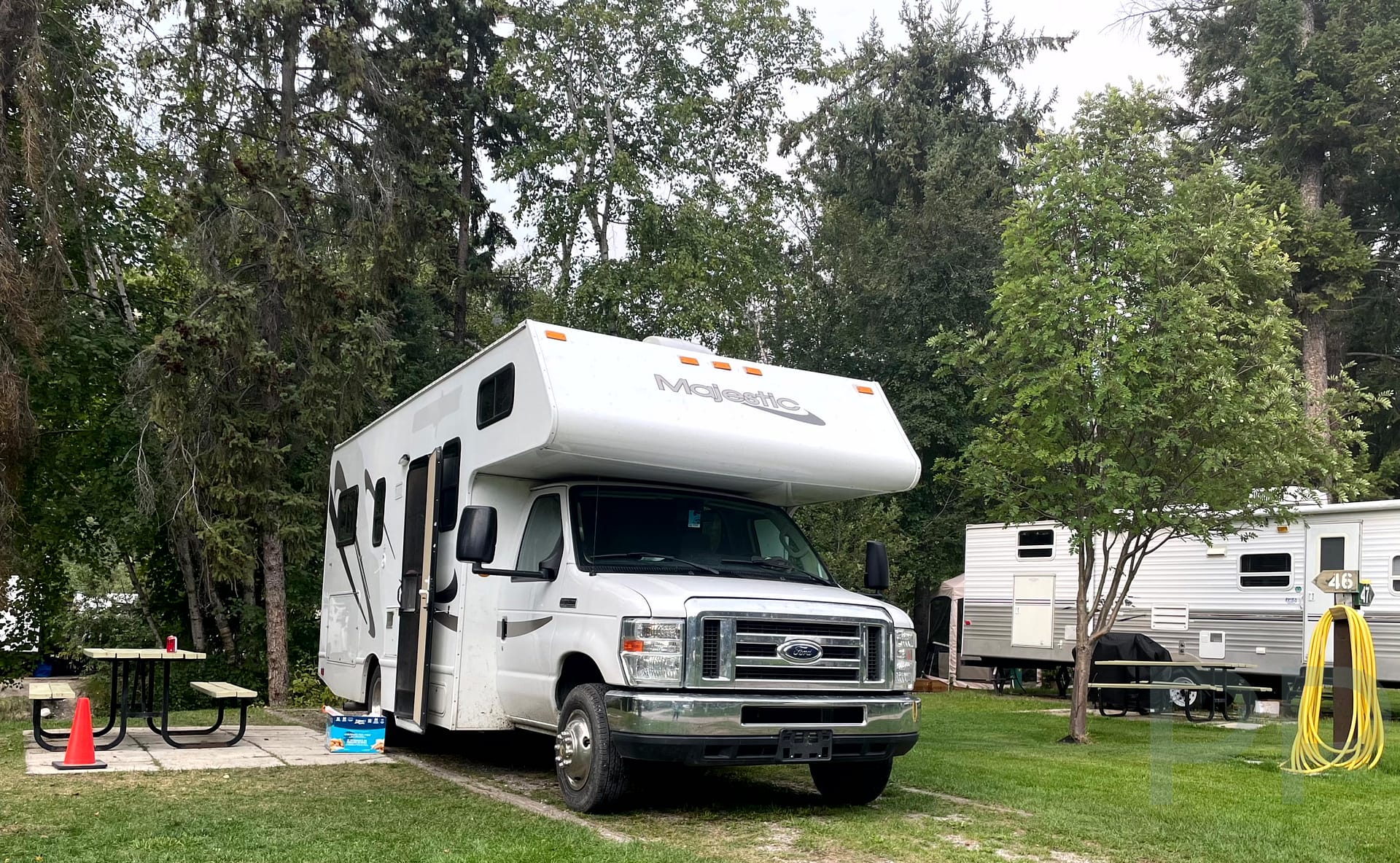 Grassy campsites at Canyon RV Resort in Radium Hot Springs, BC