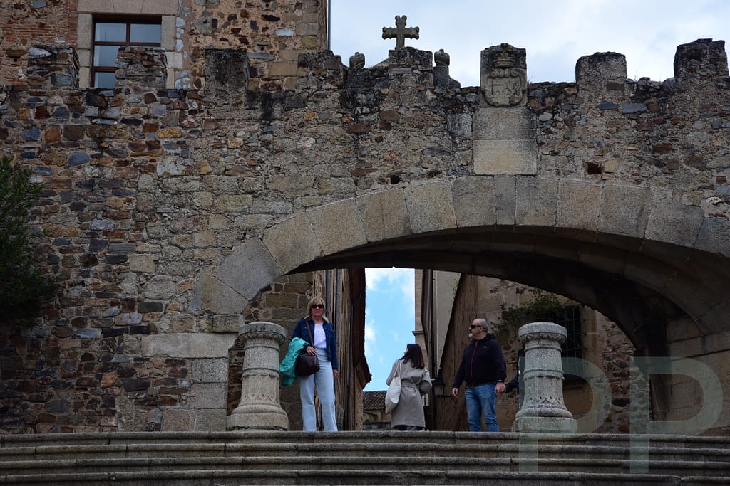 Historic Arco de la Estrella gate in C&aacute;ceres, Spain, marking the entrance to the medieval old town.