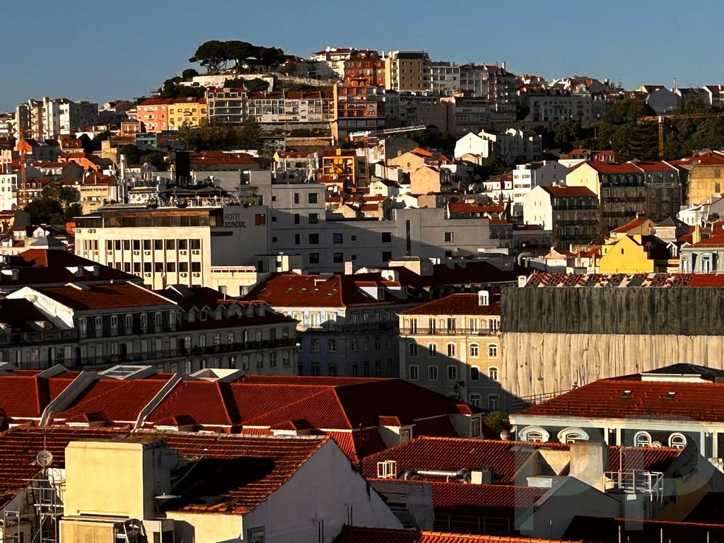 View over Lisbon from the Alfama–Graça hills, overlooking Mouraria and Baixa.