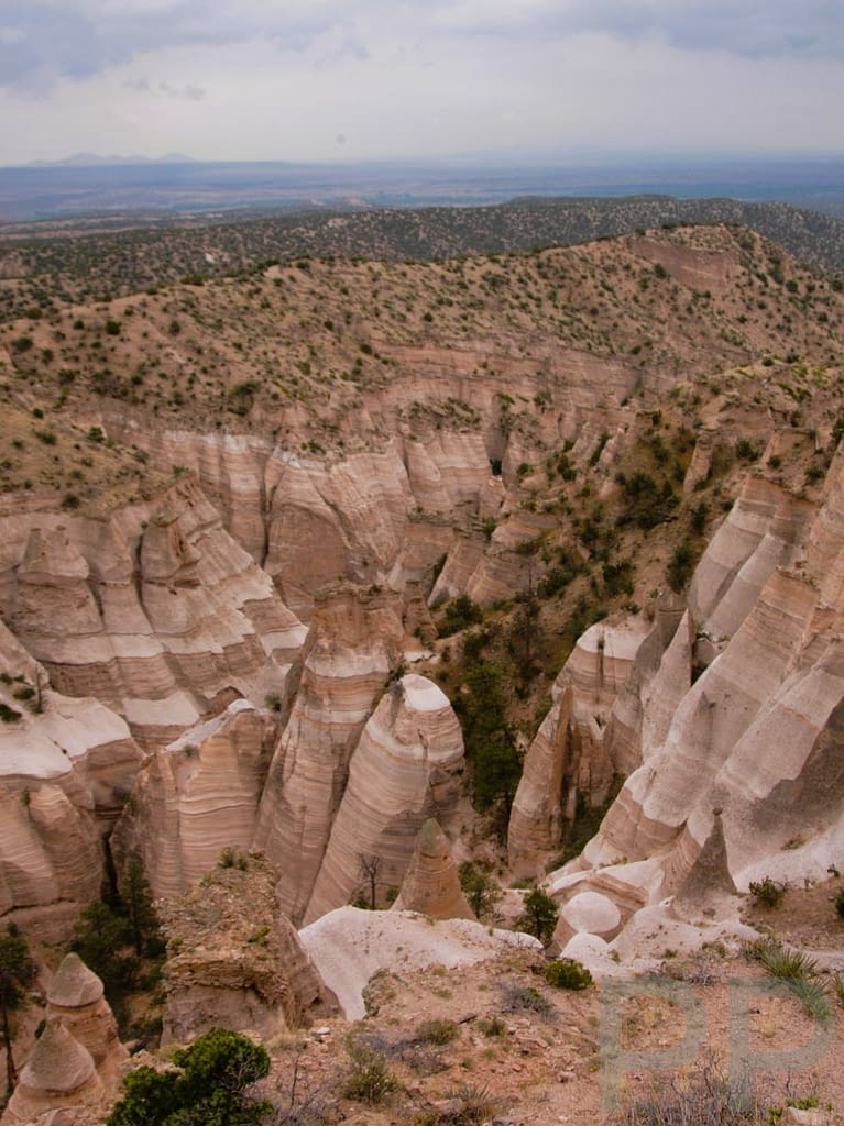 Layered volcanic cliffs and hoodoos at Kasha-Katuwe Tent Rocks National Monument