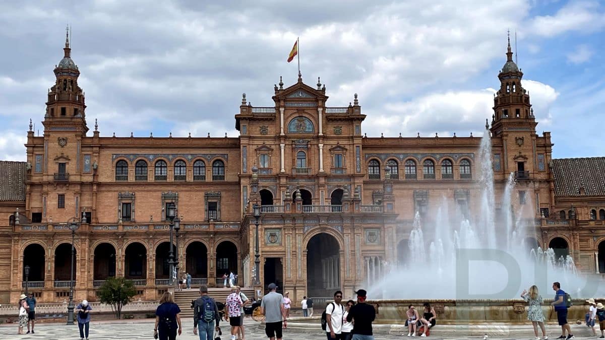 Wide view of Plaza de Espa&ntilde;a in Seville with canal and bridges