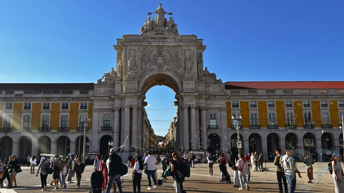 Pra&ccedil;a do Com&eacute;rcio riverfront square in Lisbon with open plaza view.