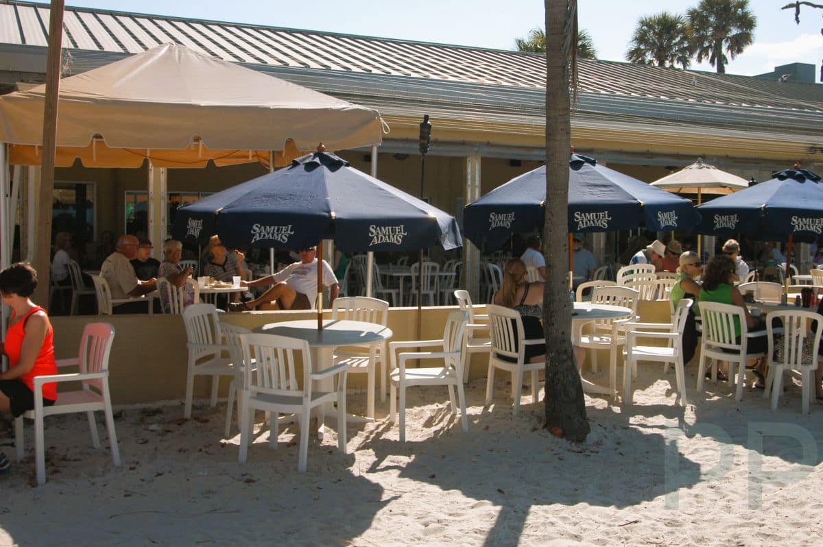 People dining outdoors at the all-you-can-eat pancake restaurant by the pier on Anna Maria Island.