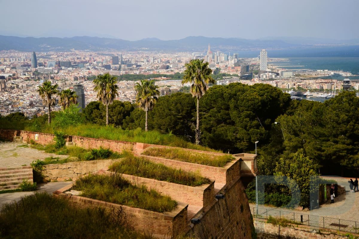 A sweeping view from Montju&iuml;c reveals Barcelona&rsquo;s unique blend of city, hills, and coastline.