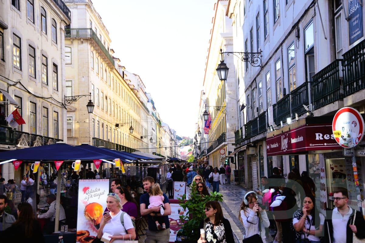 Lisbon street scene illustrating steep terrain and hillside neighborhoods.