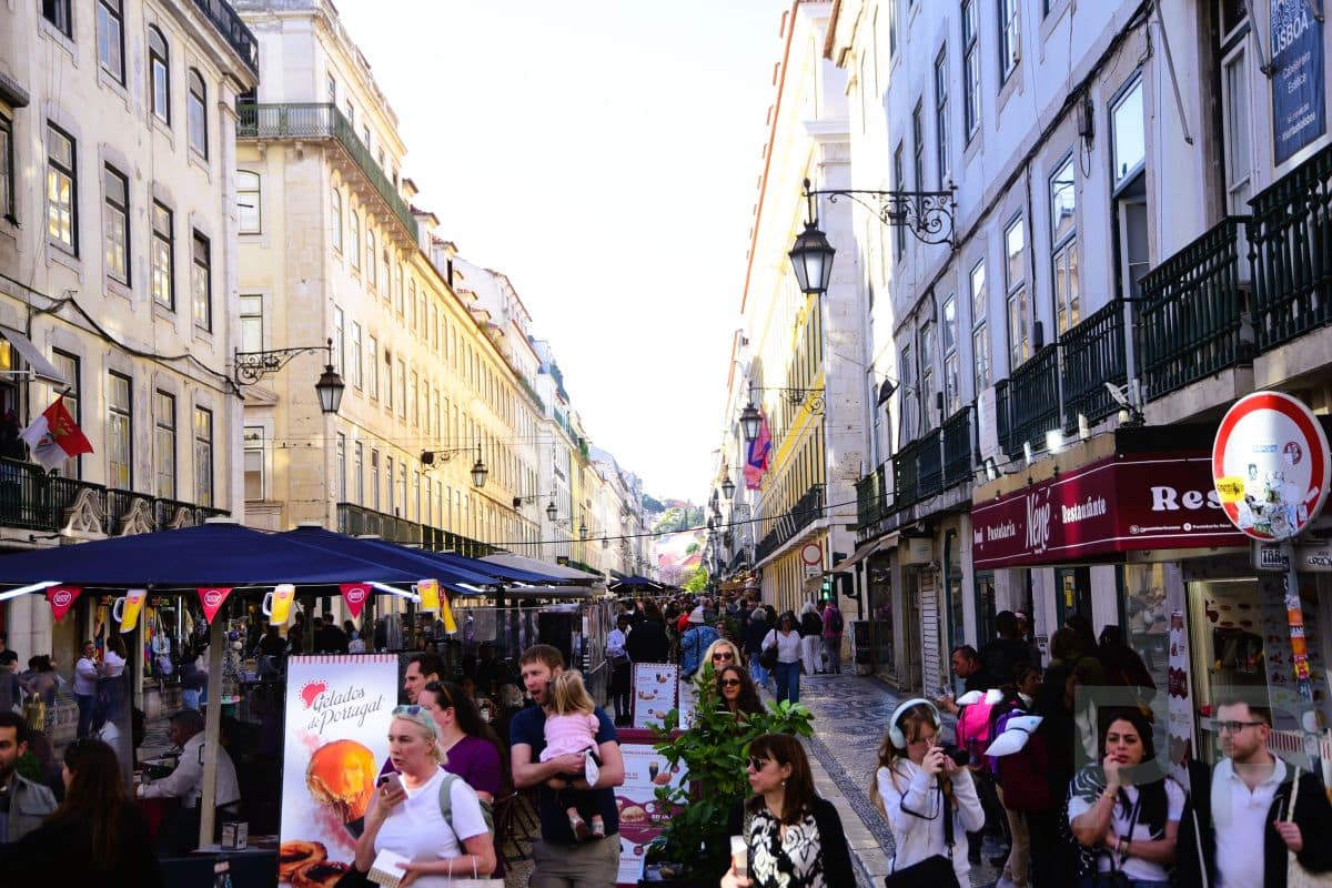 Lisbon street scene illustrating steep terrain and hillside neighborhoods.