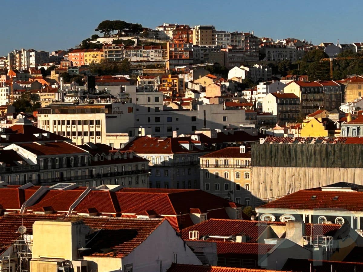 View over Lisbon from the Alfama–Graça hills, overlooking Mouraria and Baixa.