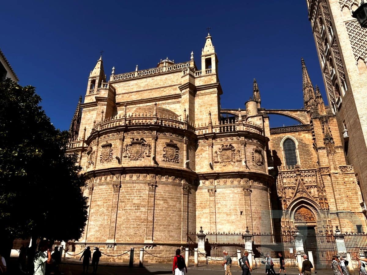 Exterior of Seville Cathedral with Gothic architecture and the Giralda tower