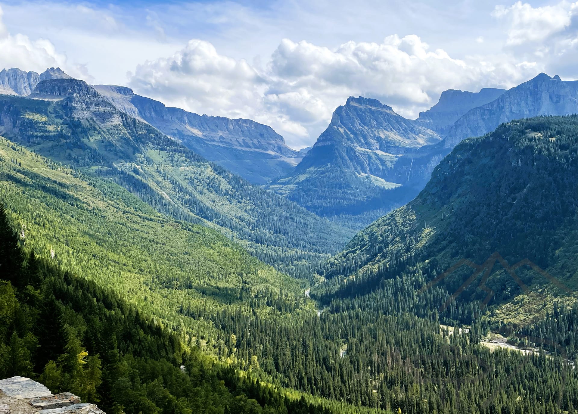 Mountain and forested valley view from The Loop on Going-to-the-Sun Road in Glacier National Park