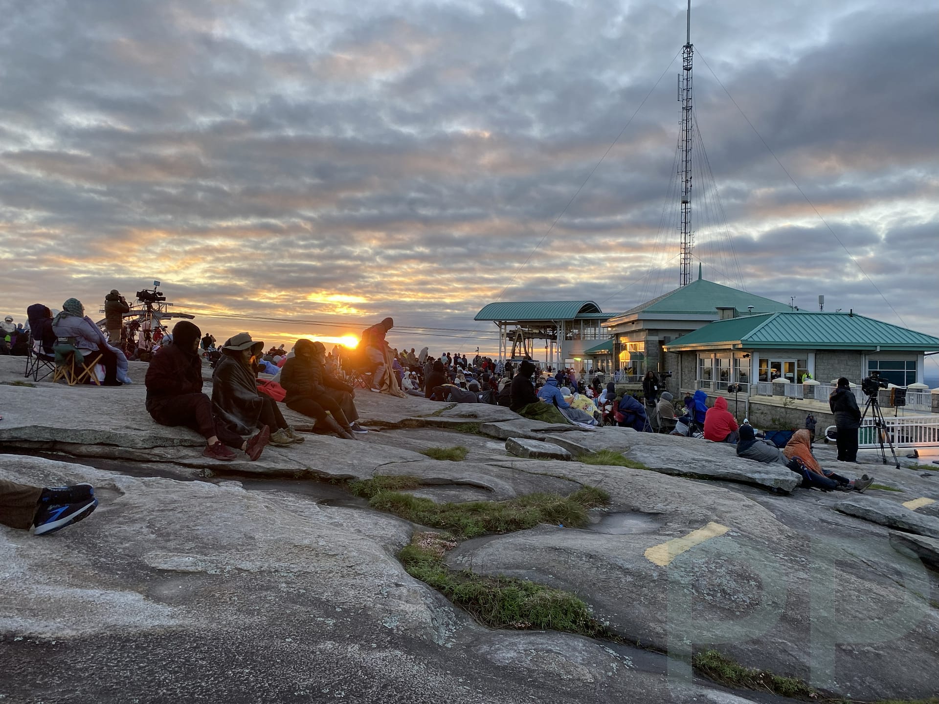 Easter sunrise service atop Stone Mountain with visitors gathered to watch the dawn.