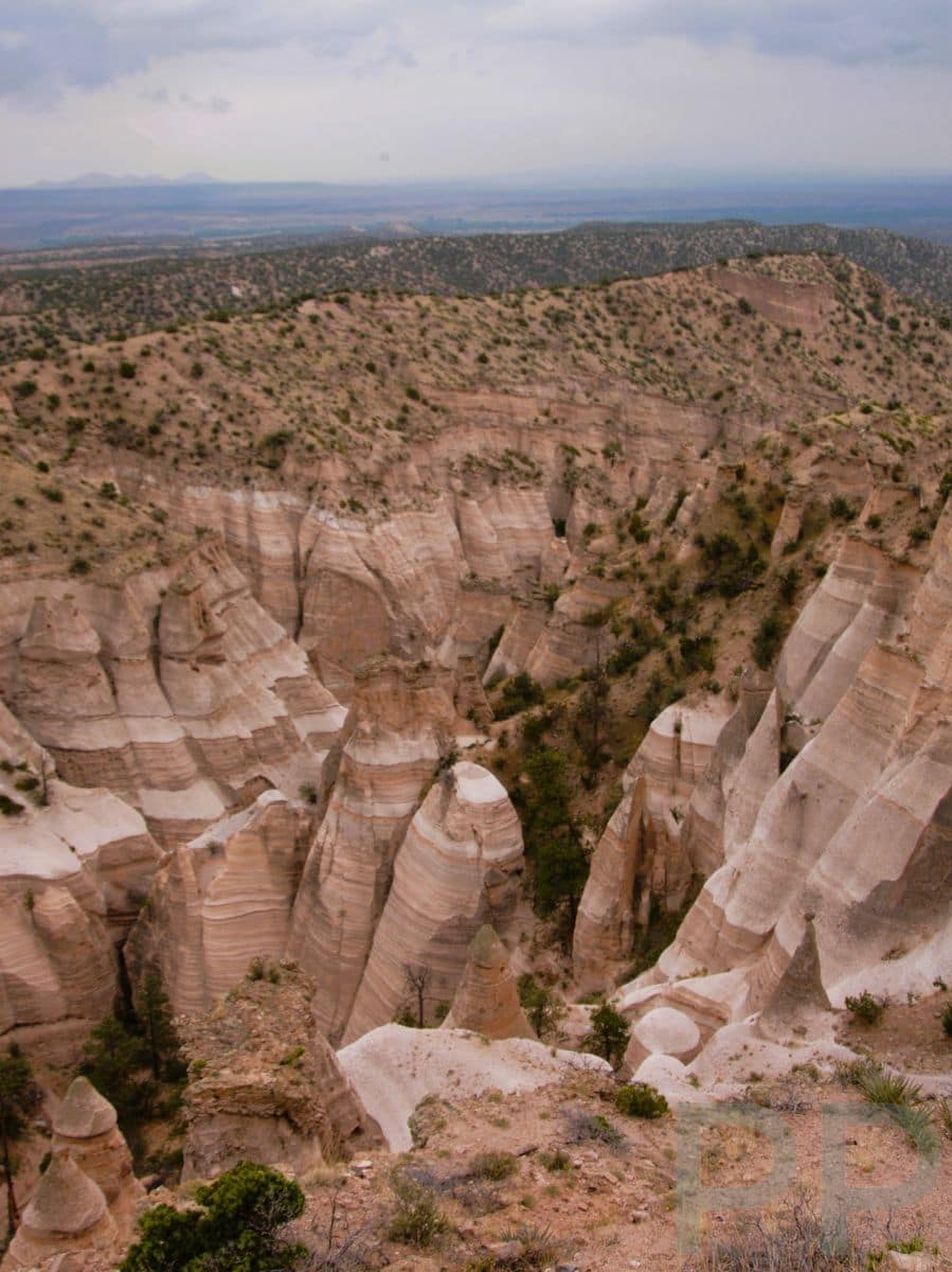Layered volcanic cliffs and hoodoos at Kasha-Katuwe Tent Rocks National Monument