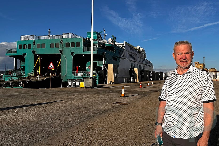 Man standing near ferry terminal before day trip from Spain to Tangier, Morocco.